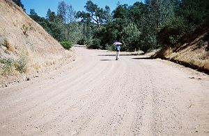 Walking along wide, deserted Kaiser Aetna Road